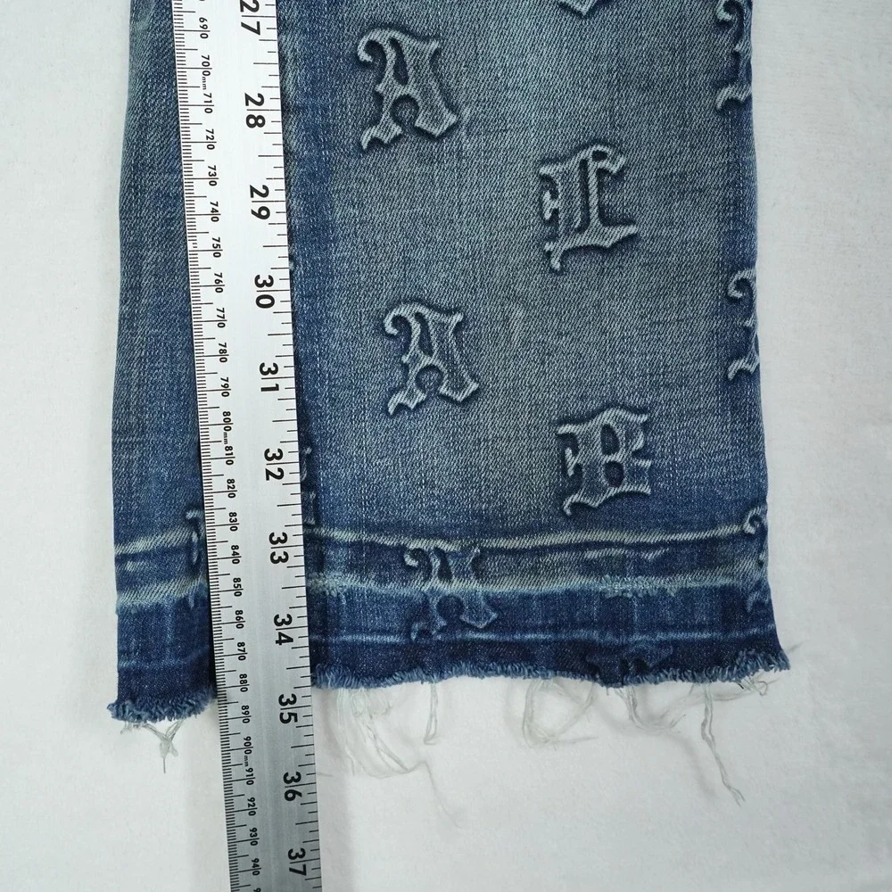 Valabasas Mens Monogram Embossed Carpenter Stacked Flare Jeans Blue Size 30